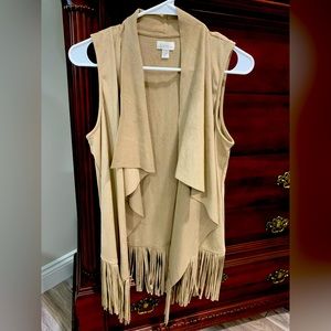 A suede fringe bottom vest